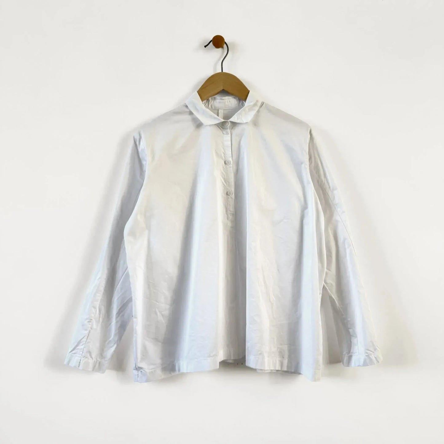 Polo in Optic White-Tops-Manuelle Guibal-eugenienewport